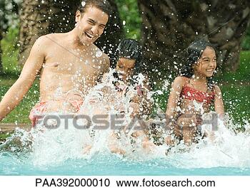 Stock Photography - father and children 
splashing in swimming 
pool. fotosearch 
- search stock 
photos, pictures, 
images, and photo 
clipart