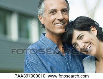 Stock Photography - mature man with 
adult daughter. 
fotosearch - search 
stock photos, 
pictures, images, 
and photo clipart
