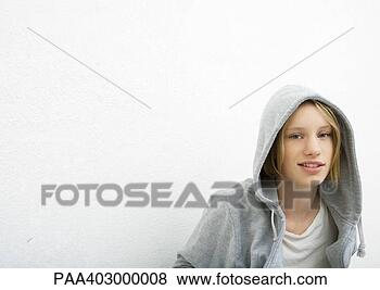 Stock Photo - teenage girl wearing 
hooded sweatshirt, 
portrait, white 
background. fotosearch 
- search stock 
photos, pictures, 
images, and photo 
clipart