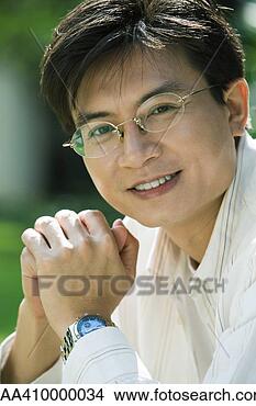 Stock Photo - man, smiling at 
camera, portrait. 
fotosearch - search 
stock photos, 
pictures, images, 
and photo clipart