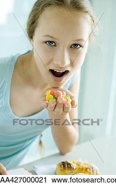 Stock Photography - girl eating junk 
food. fotosearch 
- search stock 
photos, pictures, 
images, and photo 
clipart