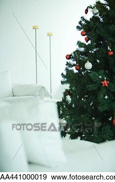 Stock Photograph - christmas tree 
in living room. 
fotosearch - search 
stock photos, 
pictures, images, 
and photo clipart