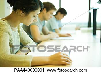 Stock Photography - college students 
sitting at table, 
studying. fotosearch 
- search stock 
photos, pictures, 
images, and photo 
clipart