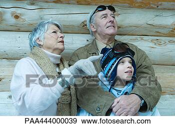 Stock Photograph - senior couple 
with grandson 
in winter clothing, 
portrait. fotosearch 
- search stock 
photos, pictures, 
images, and photo 
clipart