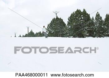 Stock Photography - snowboarder in 
mid distance, 
full length. fotosearch 
- search stock 
photos, pictures, 
images, and photo 
clipart