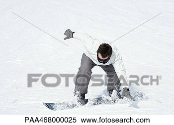 Stock Image - snowboarding bending 
forward, trying 
to keep balance. 
fotosearch - search 
stock photos, 
pictures, images, 
and photo clipart