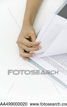 Arquivo de Fotografias - mão,  torneado, 
 documento,  páginas, 
 close-up. fotosearch 
- busca de fotos, 
imagens e clipart