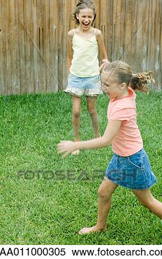 Stock Image - girl running through 
mist, screaming. 
fotosearch - search 
stock photos, 
pictures, images, 
and photo clipart