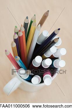 Stock Photo - mug full of colored 
pencils and markers, 
high angle view. 
fotosearch - search 
stock photos, 
pictures, images, 
and photo clipart