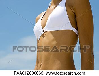 Stock Photo - woman wearing 
bikini, close-up 
of torso. fotosearch 
- search stock 
photos, pictures, 
images, and photo 
clipart
