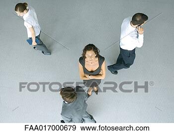 Stock Photograph - mature businesswoman 
standing with 
arms folded and 
eyes closed. fotosearch 
- search stock 
photos, pictures, 
images, and photo 
clipart