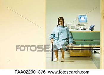 Stock Photo - female patient 
sitting in doctor's 
office,  looking 
at camera,  view. 
fotosearch - search 
stock photos, 
pictures, images, 
and photo clipart