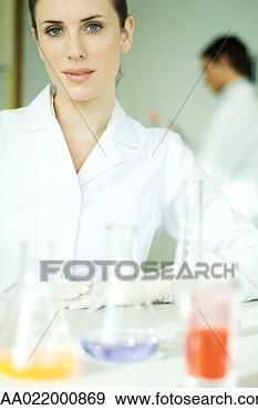 Stock Photograph - female scientist, 
looking at camera, 
portrait. fotosearch 
- search stock 
photos, pictures, 
images, and photo 
clipart
