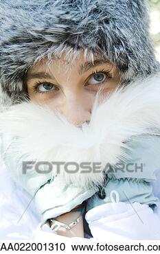 Stock Photography - teenage girl wearing 
fur hat,  pushing 
fur collar over 
mouth. fotosearch 
- search stock 
photos, pictures, 
images, and photo 
clipart
