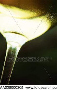 Stock Image - white wine glass, 
extreme close-up, 
low angle view. 
fotosearch - search 
stock photos, 
pictures, images, 
and photo clipart