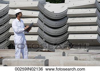 Stock Photo - man in work uniform 
writing on clipboard. 
fotosearch - search 
stock photos, 
pictures, images, 
and photo clipart