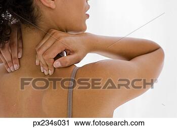 Stock Photography - woman rubbing 
her back. fotosearch 
- search stock 
photos, pictures, 
images, and photo 
clipart