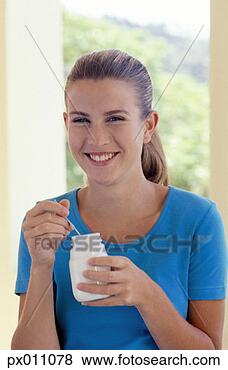 Stock Photo - woman, food, dairy 
product. fotosearch 
- search stock 
photos, pictures, 
images, and photo 
clipart
