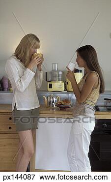 Picture - two woman chatting 
over coffee. fotosearch 
- search stock 
photos, pictures, 
images, and photo 
clipart