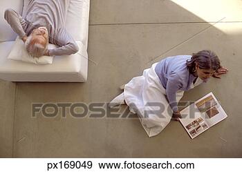 Stock Photograph - high angle view 
of a middle aged 
couple spending 
time together. 
fotosearch - search 
stock photos, 
pictures, images, 
and photo clipart