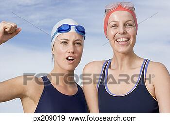 Stock Photograph - female swimmers 
cheering. fotosearch 
- search stock 
photos, pictures, 
images, and photo 
clipart