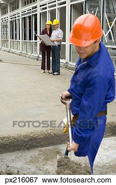 Picture - construction worker 
digging at site. 
fotosearch - search 
stock photos, 
pictures, images, 
and photo clipart