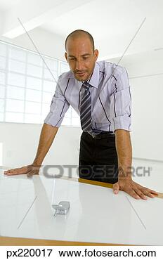 Picture - businessman with 
cell phone. fotosearch 
- search stock 
photos, pictures, 
images, and photo 
clipart