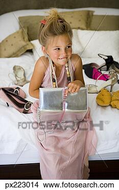 Stock Photo - girl playing dress-up. 
fotosearch - search 
stock photos, 
pictures, images, 
and photo clipart