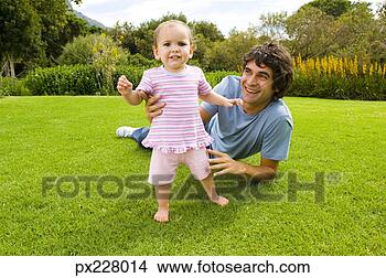 Stock Photo - father and daughter 
outdoors. fotosearch 
- search stock 
photos, pictures, 
images, and photo 
clipart