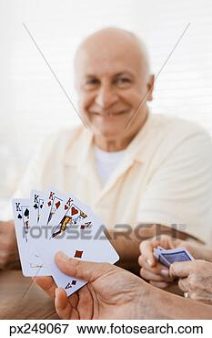 Picture - friends playing 
cards. fotosearch 
- search stock 
photos, pictures, 
images, and photo 
clipart