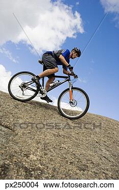 Banco de Imagem - homem,  montando, 
 montanha,  bicicleta. 
fotosearch - busca 
de fotos, imagens 
e clipart