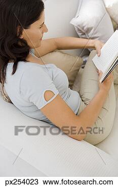 Stock Photo - woman reading 
book. fotosearch 
- search stock 
photos, pictures, 
images, and photo 
clipart