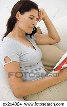 Stock Photo - woman reading 
book. fotosearch 
- search stock 
photos, pictures, 
images, and photo 
clipart