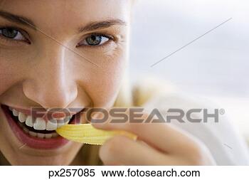 Stock Image - woman eating corn. 
fotosearch - search 
stock photos, 
pictures, images, 
and photo clipart