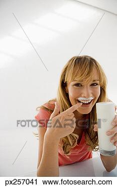Stock Photography - woman with milk 
mustache. fotosearch 
- search stock 
photos, pictures, 
images, and photo 
clipart