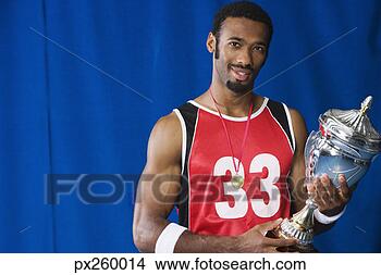 Banco de Imagem - basquetebol,  
jogador,  troféu. 
fotosearch - busca 
de fotos, imagens 
e clipart