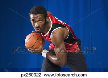 Stock Photo - man with basketball. 
fotosearch - search 
stock photos, 
pictures, images, 
and photo clipart