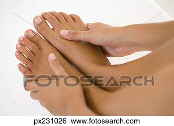 Stock Photo - hands massaging 
bare feet. fotosearch 
- search stock 
photos, pictures, 
images, and photo 
clipart