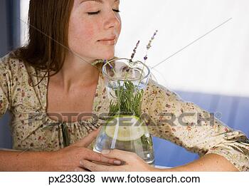 Stock Photo - woman with flower 
vase. fotosearch 
- search stock 
photos, pictures, 
images, and photo 
clipart