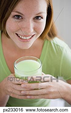 Stock Photo - woman with glass 
of juice. fotosearch 
- search stock 
photos, pictures, 
images, and photo 
clipart