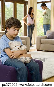 Stock Photo - boy with teddy 
bear and parents 
fighting. fotosearch 
- search stock 
photos, pictures, 
images, and photo 
clipart
