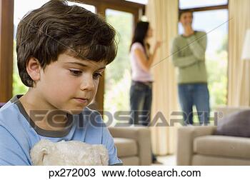 Stock Photo - boy with teddy 
bear and parents 
fighting. fotosearch 
- search stock 
photos, pictures, 
images, and photo 
clipart