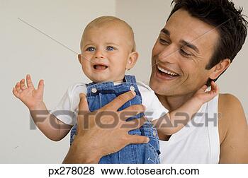 Banco de Imagem - pai,  segurando, 
 filho. fotosearch 
- busca de fotos, 
imagens e clipart