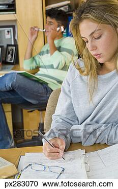 Stock Photography - teenagers doing 
homework. fotosearch 
- search stock 
photos, pictures, 
images, and photo 
clipart