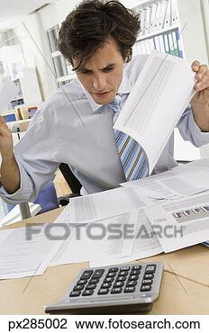 Stock Photo - businessman in 
office. fotosearch 
- search stock 
photos, pictures, 
images, and photo 
clipart