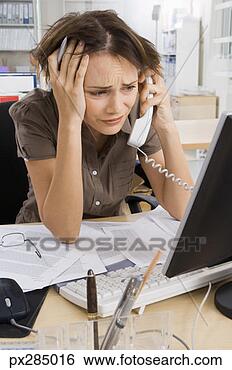 Stock Photo - frustrated businesswoman 
in office. fotosearch 
- search stock 
photos, pictures, 
images, and photo 
clipart