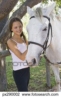 Banco de Imagem - menina,  cavalo. 
fotosearch - busca 
de fotos, imagens 
e clipart