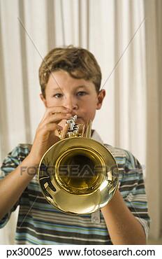 Stock Image - boy playing trumpet. 
fotosearch - search 
stock photos, 
pictures, images, 
and photo clipart