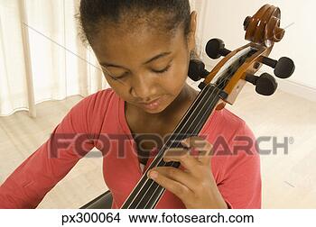 Stock Photo - girl playing cello. 
fotosearch - search 
stock photos, 
pictures, images, 
and photo clipart