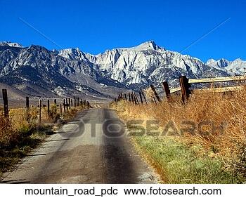 Stock Photography - range, road, mountains, 
fencepost, fences, 
grasses, mountain_road. 
fotosearch - search 
stock photos, 
pictures, images, 
and photo clipart